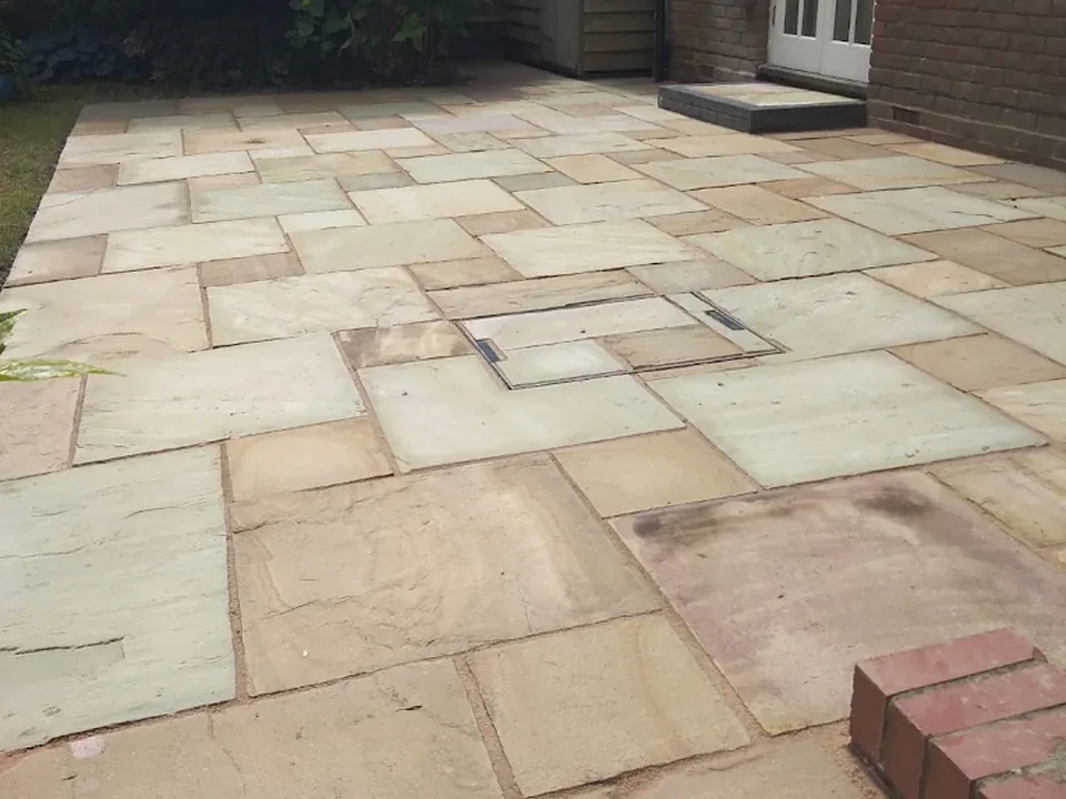 Natural stone patio in a mature rear garden